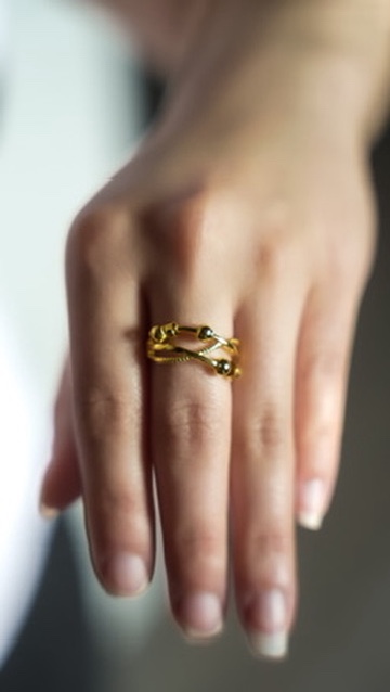 Elegant Sarora jewelry worn by model in natural light